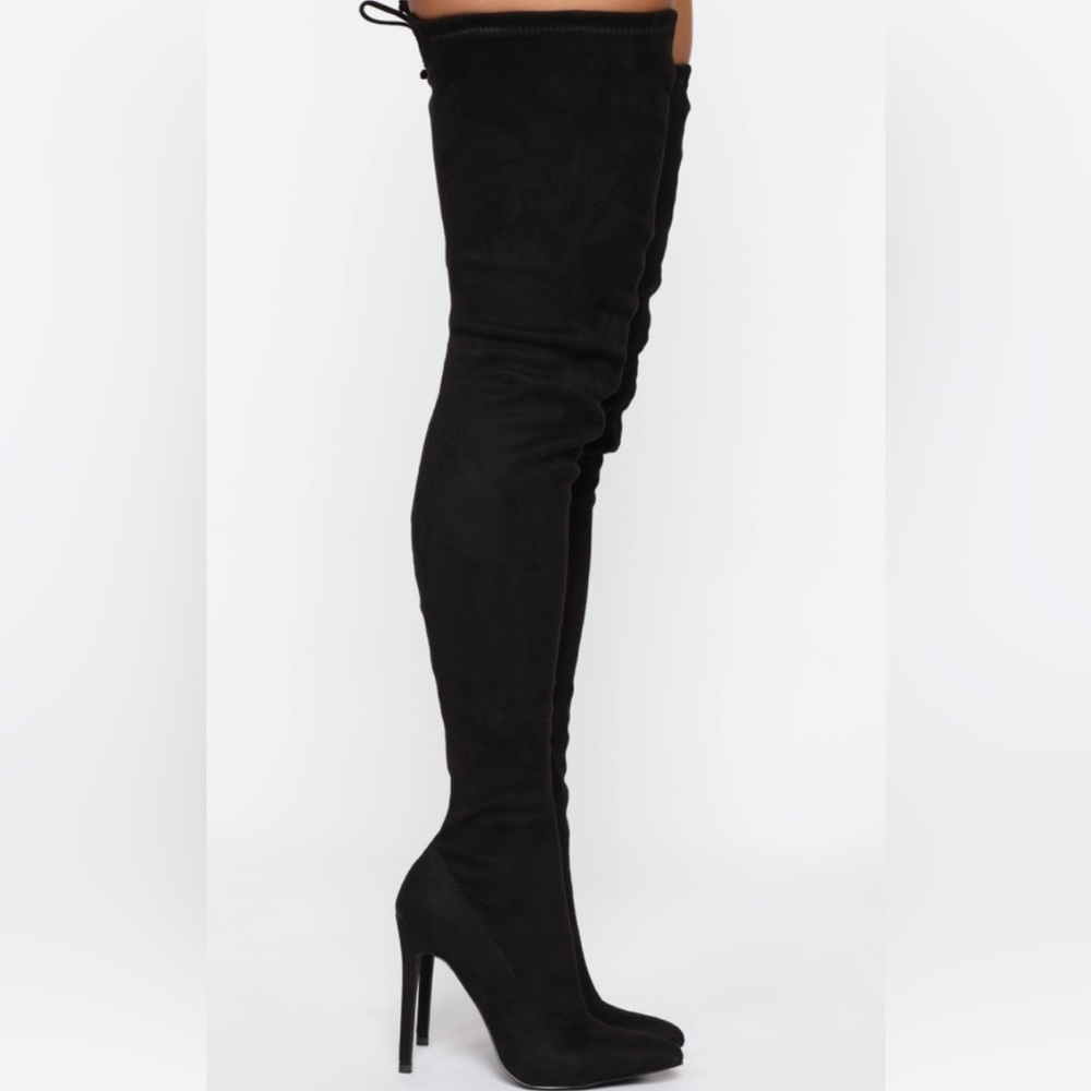 Black thigh high heeled boots